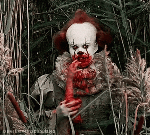 Clown With Blood Holding Bloody Hand
