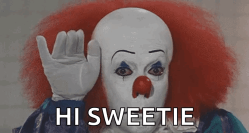 Clown With Red Hair and Red Nose Says Hi Sweetie