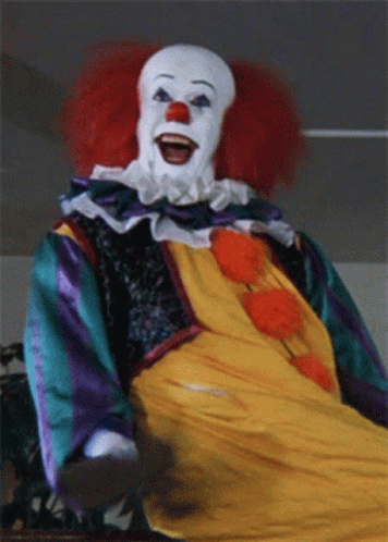 Clown with Red Hair and White Face