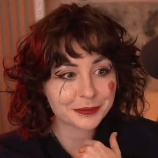 Clown Woman with Curly Hair and Red Lipstick