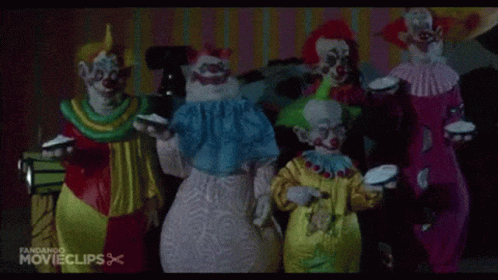 Clowns Holding Cupcakes