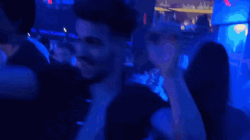 Excited Man Dancing At Night Club Party GIF