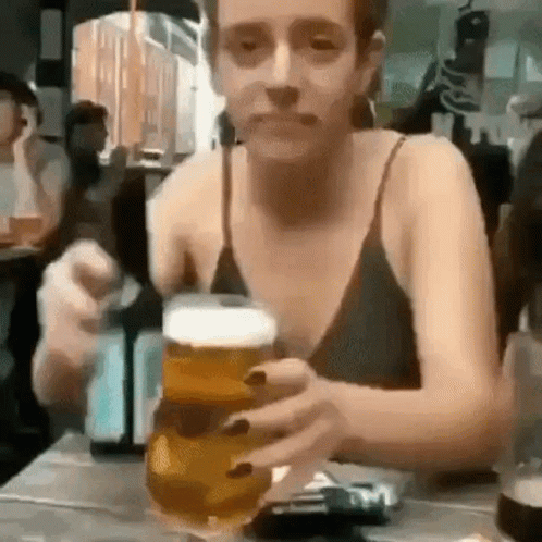 Clumsy Woman Chugging Beer GIF