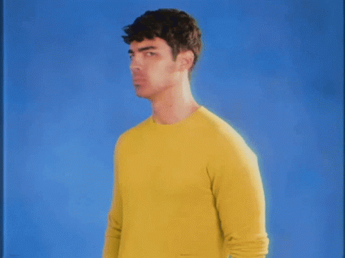 Clutching Pearls Nick Jonas Shocked GIF