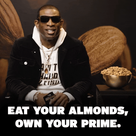 Coach Prime Eat Your Almonds GIF