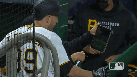 Coach Using An Ipad Pro GIF