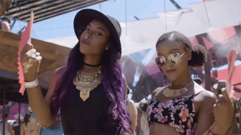 Coachella Goers Beat The Heat With Fans GIF