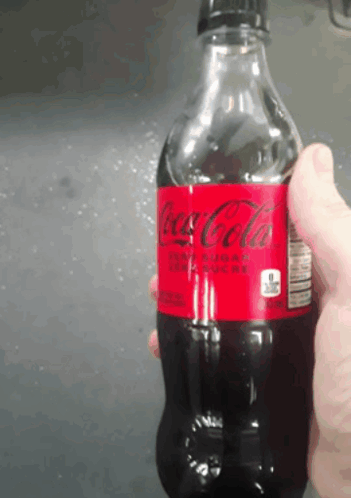 Coca Cola Bottle With Spoon GIF