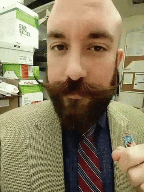 Cocky Guy Showcasing Well Groomed English Mustache GIF