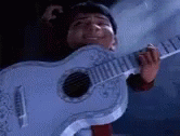 Coco Miguel Playing Guitar Inside Fire GIF