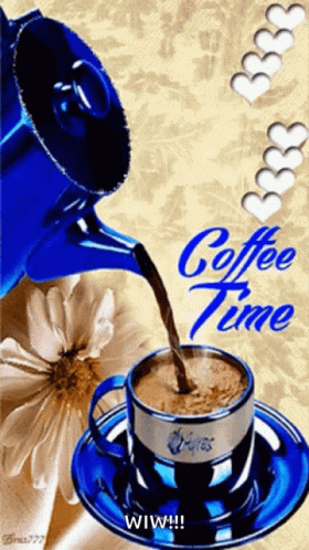 Coffee Being Poured From Blue Tea Kettle