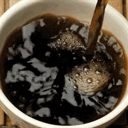 Coffee Being Poured into Bowl