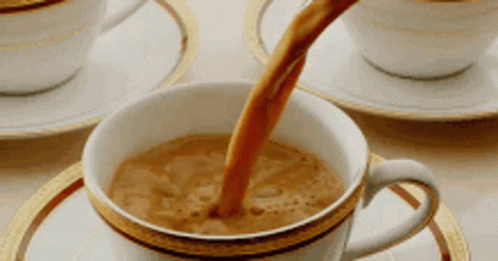 Coffee Being Poured Into Cup