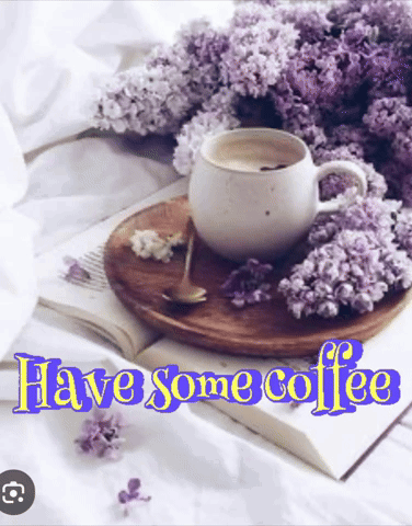 Coffee Cup on Wooden Tray With Purple Flowers Saying Have Some Coffee