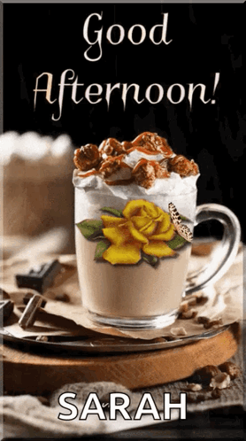 Coffee Cup With Whipped Cream and Rose