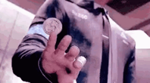 Coin Playing On The Finger GIF