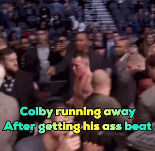 Colby Running Away After Getting His Ass Beat In A Crowded Stadium GIF