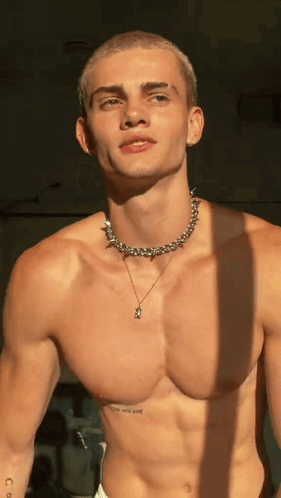 Cole Etgen Showing Off His Abs GIF