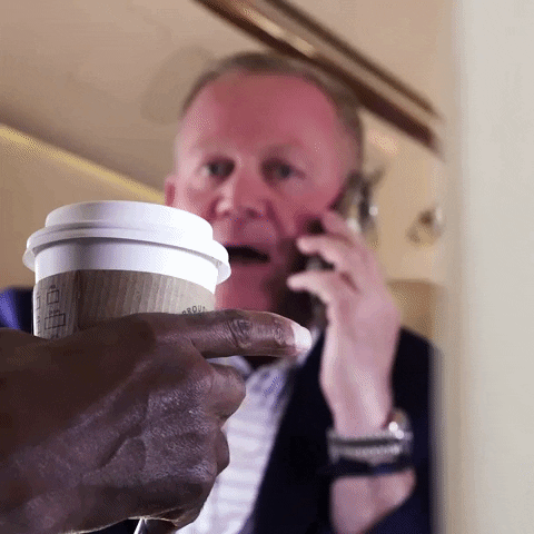 Colleague Of Ed Orgeron Talking On Phone GIF