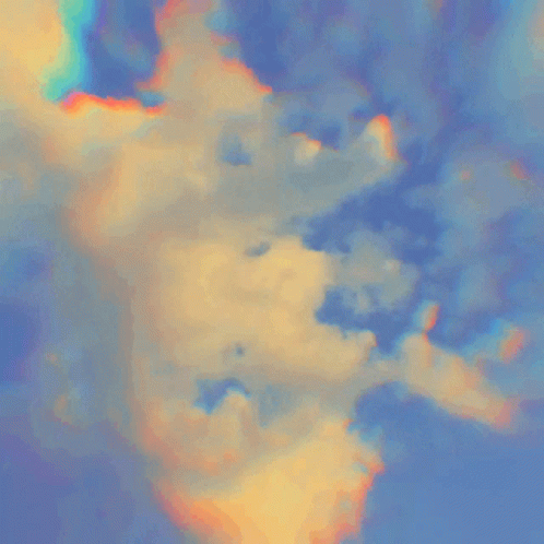 Colorful Clouds In A Blue Sky With A Rainbow In The Middle GIF