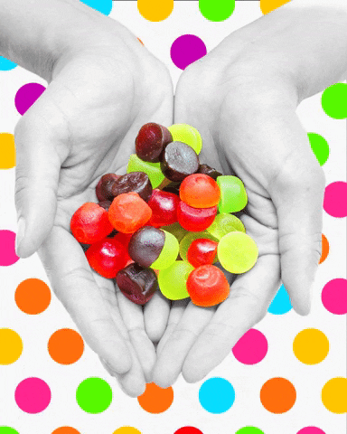 Colorful Gummies On Palm GIF