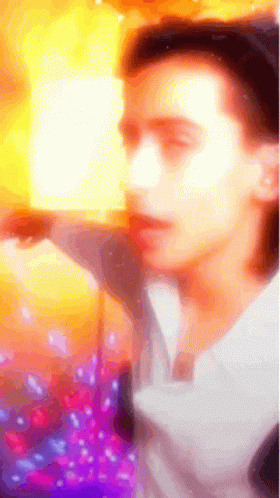 Colorful Man Holding Book GIF