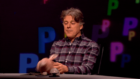 Comedian Alan Davies Making Toy Pig Fly GIF