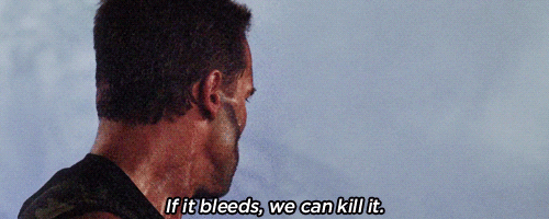 Commando Arnold Schwarzenegger Looking Behind GIF