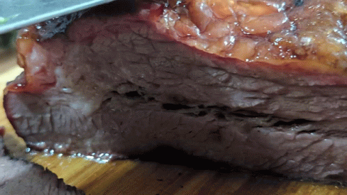 Compressing Juicy Brisket GIF
