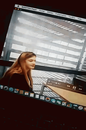Computer Screen With Woman And QuickTime Player GIF