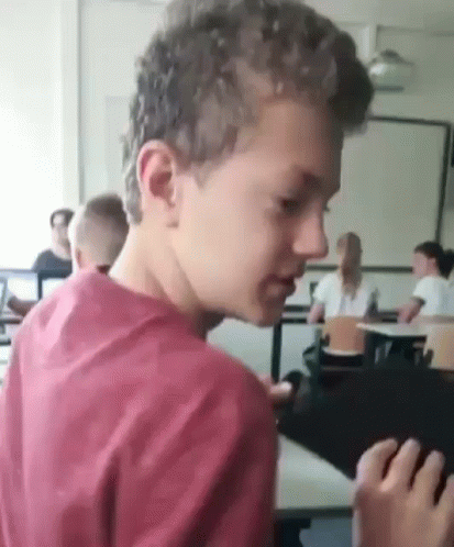Concerned School Kid Head Turn GIF
