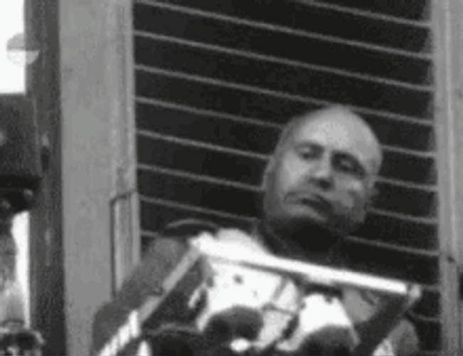 Confident Benito Mussolini Crossing Arms GIF