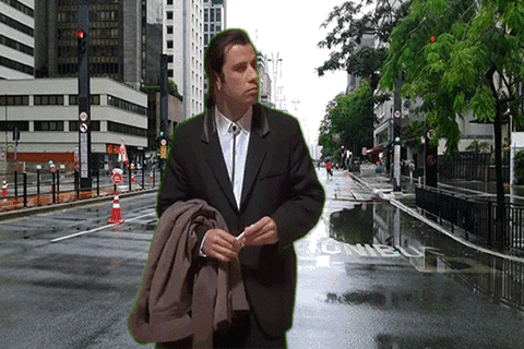Confused Actor John Travolta On The Road GIF
