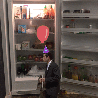 Confused Actor John Travolta With Balloon GIF