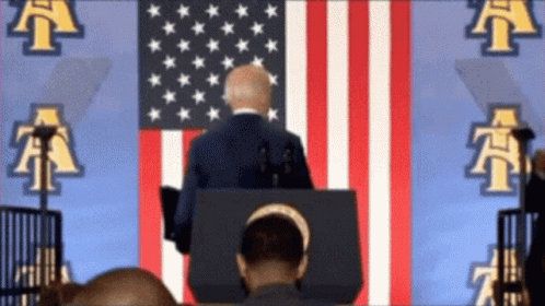Confused Joe Biden Falling Out Of Queue GIF