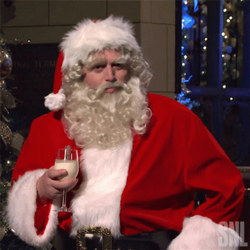 Confused Santa Holding Glass Of Milk GIF