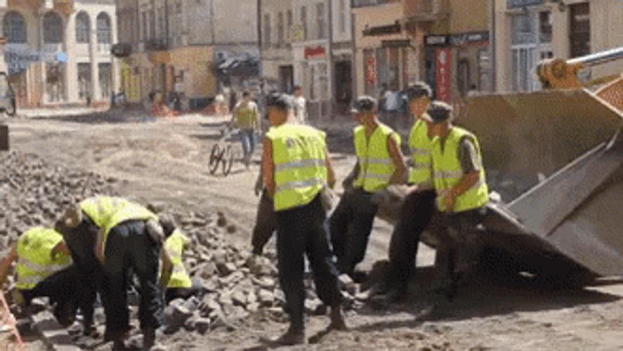 Construction Workers Tossing Rocks GIF