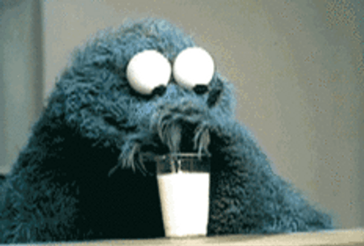 Cookie Monster Drinking Milk GIF.