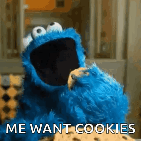 Cookie Monster Eating A Cookie With The Words " Me Want Cookies " On The Bottom GIF