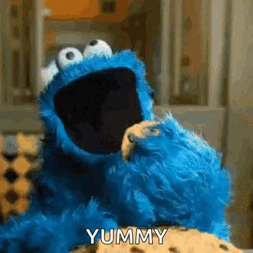Cookie Monster Eating Cookie Saying Yummy