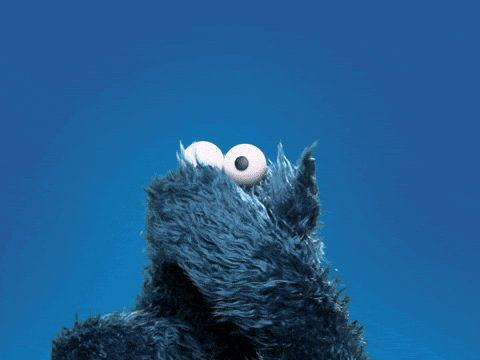 Cookie Monster From Sesame Street Looks Up At The Sky With His Mouth Open GIF