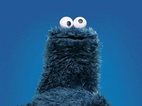 Cookie Monster From Sesame Street Looks Up Into The Sky GIF