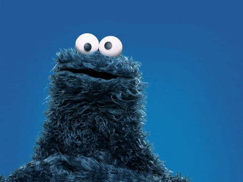 Cookie Monster From Sesame Street Shows Off His Muscles In Front Of A Blue Background GIF