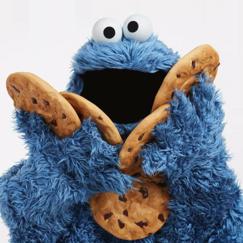 Cookie Monster Having Multiple Famous Amos Cookies GIF