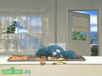 Cookie Monster Quickly Eating Cookies GIF