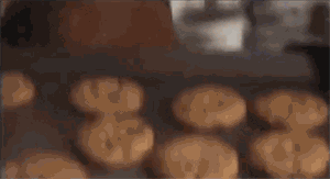 Cookies Flying From Tray GIF