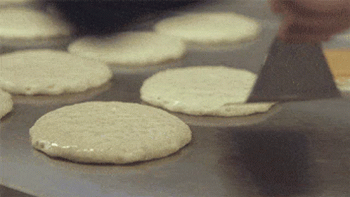 Cooking Bunch Of Pancakes GIF