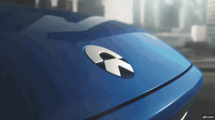 Cool Blue Electric Car Driving Around GIF