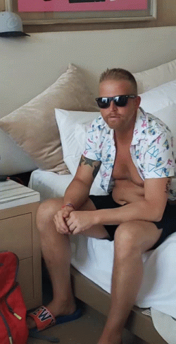 Cool Guy Sitting In Bed GIF