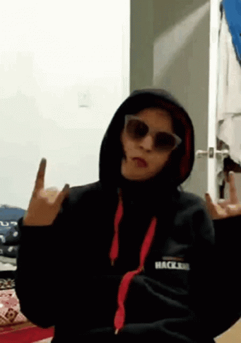 Cool Mom Lady Wearing Shades And Jacket GIF